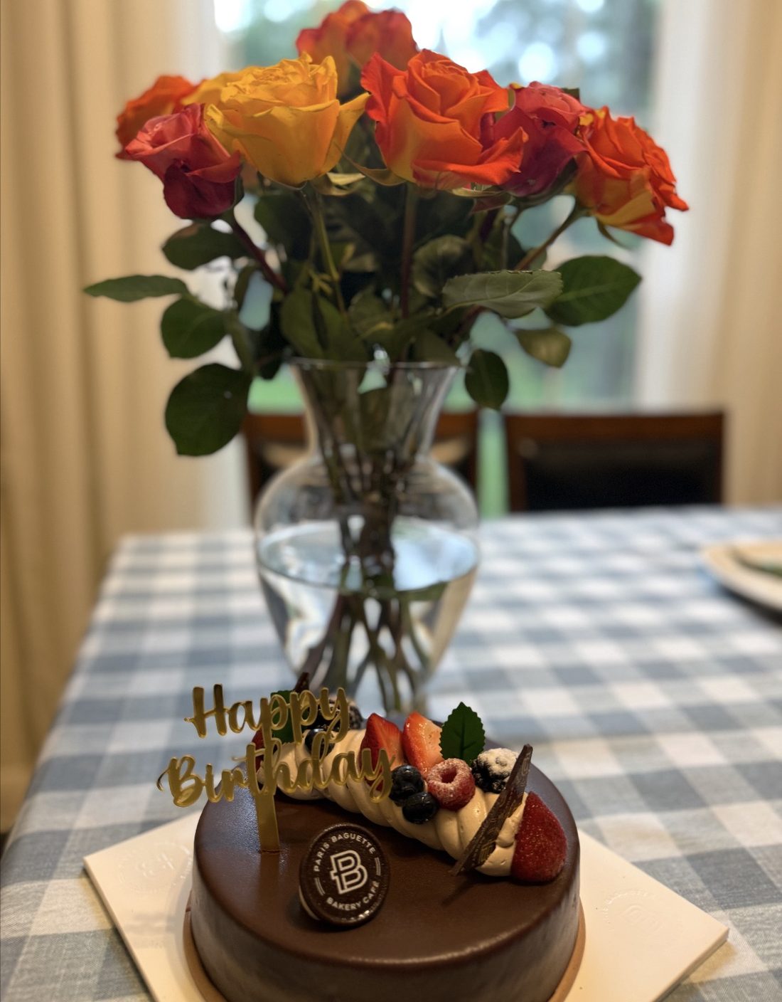Birthday cake with fresh roses