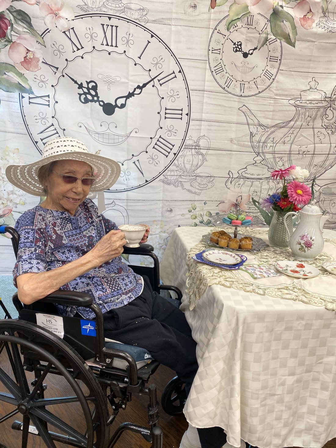 Resident at an Alice in Wonderland themed tea party