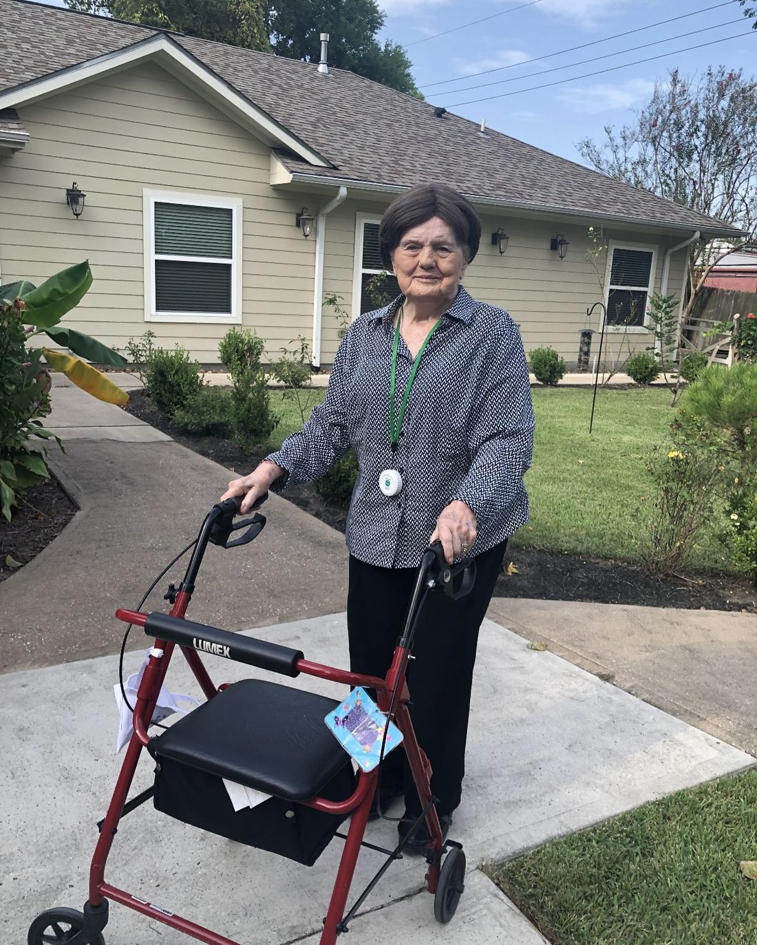 Resident walking in the front yard